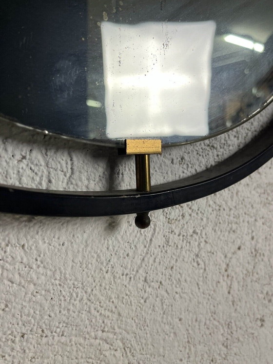 Image 1 of Round varnished metal and brass mirror with chain, 1950s