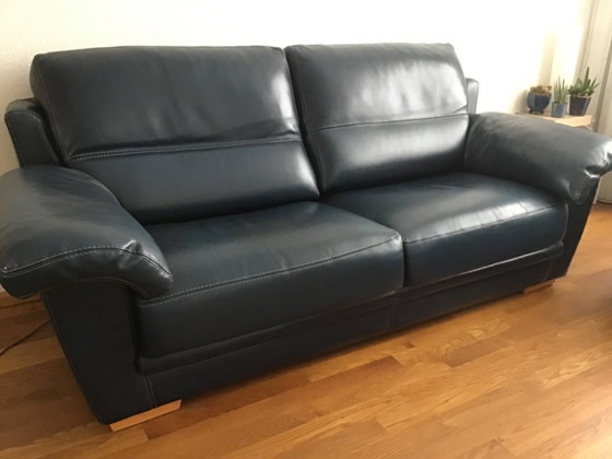 Image 1 of 2 blue leather sofas