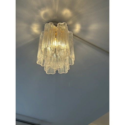Plafoniera moderna in vetro di Murano "Tronchi" color oro.