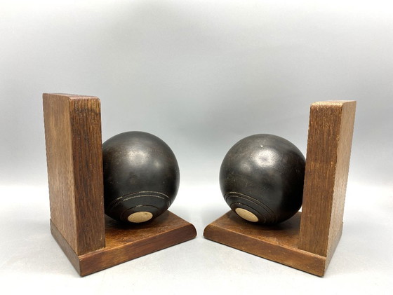 Image 1 of Vintage Lawn Bowl Boekensteunen – Houten Bookends met Zwarte Bowls – Sport Deco – Stoere Man Cave Decor – Uniek Cadeau
