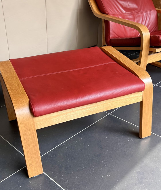 Image 1 of Red leather armchair with footstool
