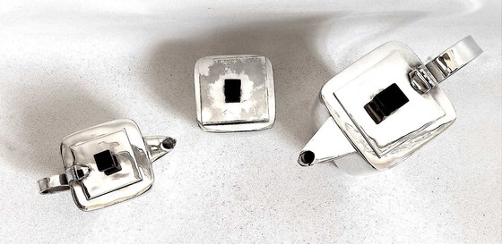 Image 1 of Servizio da tè Art Déco in tre pezzi, in argento e palissandro.