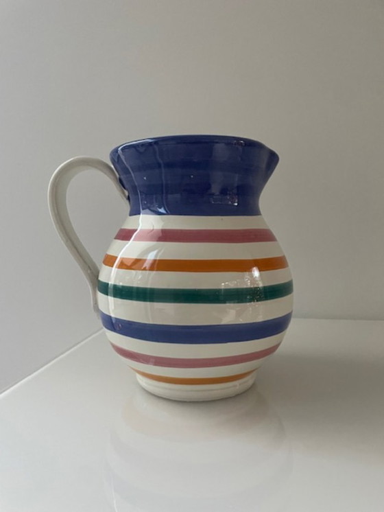 Image 1 of Handgemaakte vintage schenkkan met kleurrijke strepen