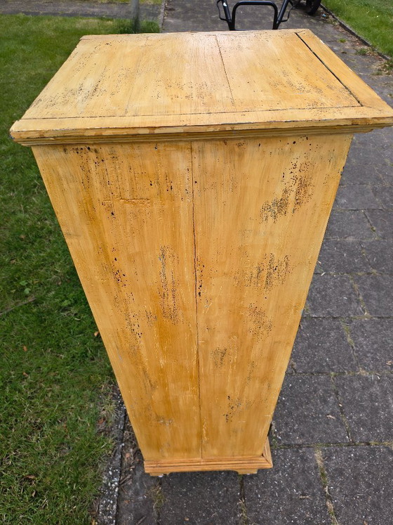 Image 1 of Vintage ochre yellow chest of drawers / apothecary