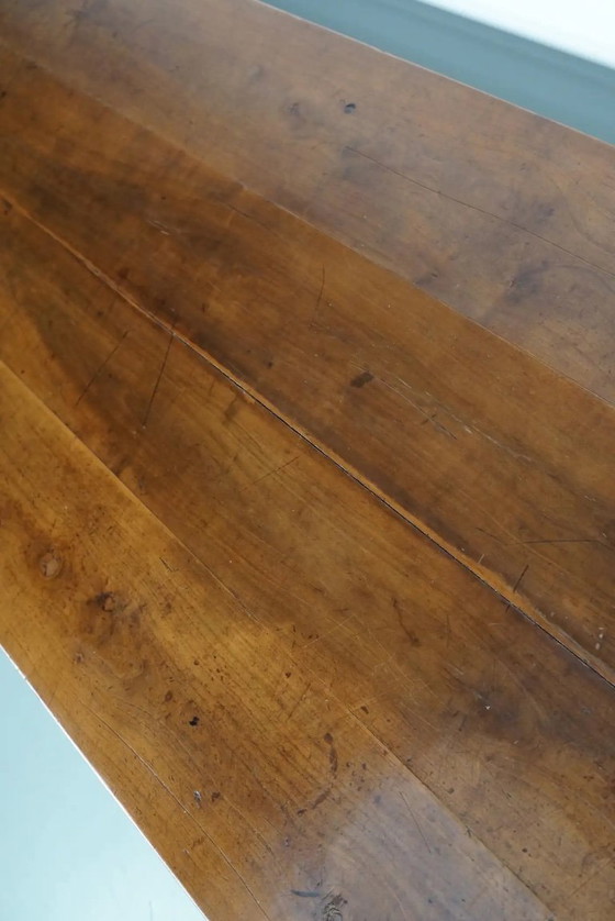 Image 1 of Antiker französischer rustikaler Bauernhaus-Esstisch aus Kirschholz aus dem frühen 20. Jahrhundert