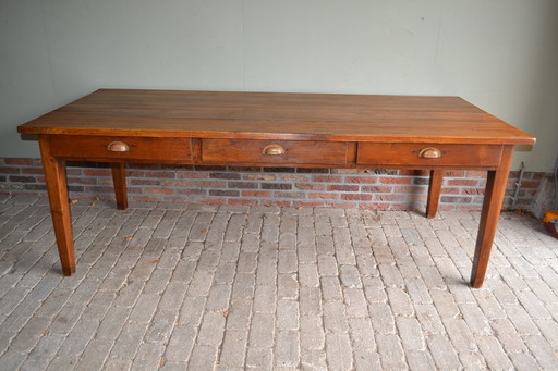 Large antique oak wooden dining table with 6 drawers.