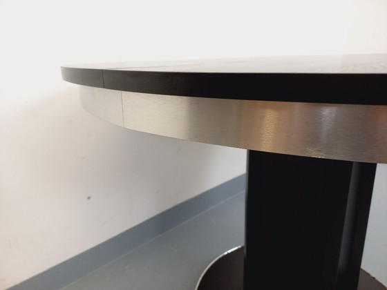 Image 1 of Table ronde de repas vintage en mélaminé esprit bois noir et métal chromé style Space Age / Diner des années 70 avec rallonge in