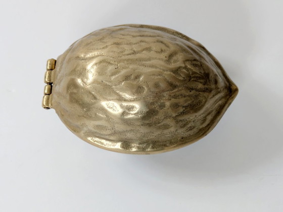 Image 1 of Cascanueces de nogal y latón de mediados de siglo | Decoración navideña de latón macizo