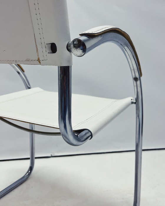 Image 1 of Vintage tubular frame chairs with white skai