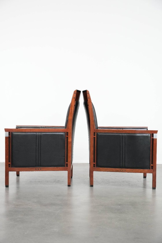 Image 1 of 2 x Black cowhide Art Deco design armchairs with high backs by Schuitema