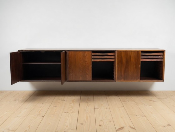 Image 1 of Poul Cadovius zwevend wanddressoir van palissanderhout, van CADO, jaren 1960.