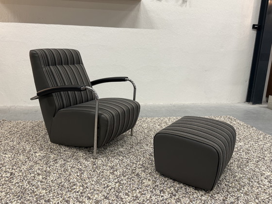 Image 1 of Leolux Scylla high armchair with Belluno fabric pouf in gray leather