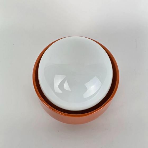 Image 1 of Vintage German ceramic lamp with a glass globe shade. Can be used as a wall lamp, table lamp, or sconce. Orange. 70s / retro