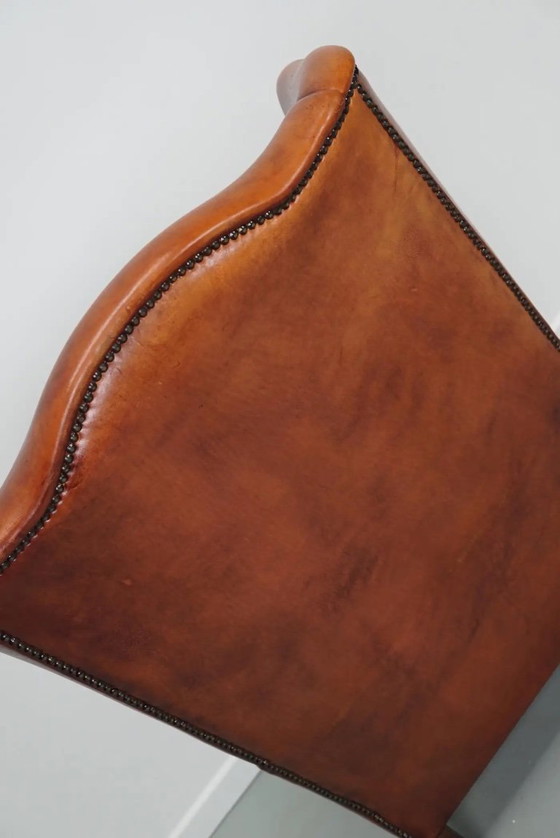 Image 1 of Vintage Nederlandse cognackleurige leren clubfauteuil met vleugelrug