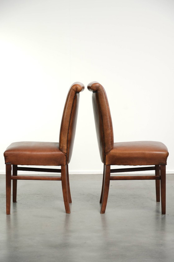 6x Begeerlijke schapenleren eetkamerstoel in een mooie cognac kleur met een mooi patina – Eetkamerstoelen (photo 5 of 17)