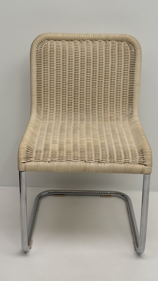 Chaise vintage Tecta design à structure tubulaire beige chromée