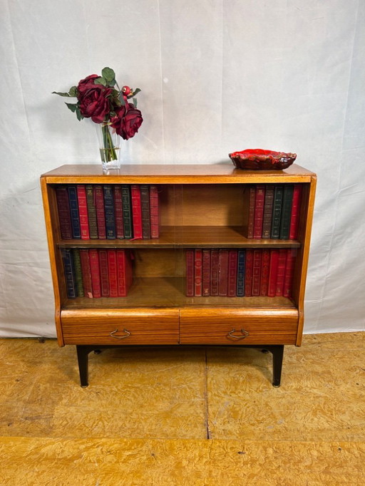 Mid-Century Retro Vintage Teak Bookcase by Jentique – 1960s  This elegant mid-century teak bookcase by Jentique fine example