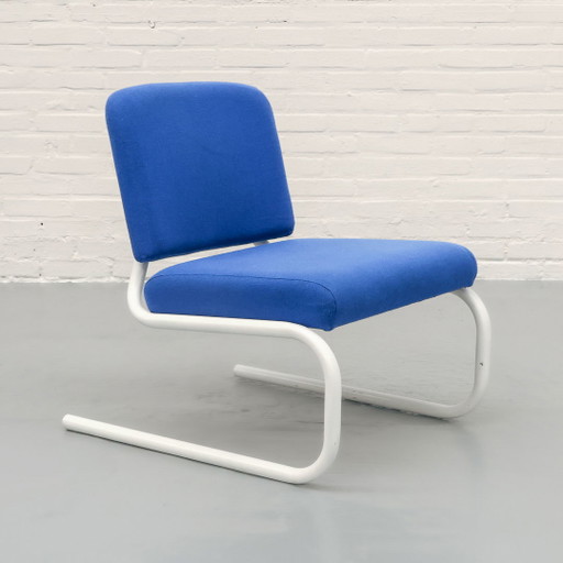 Fauteuil vintage à structure tubulaire