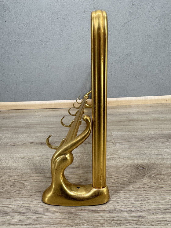 Image 1 of Vintage metalen wandkapstok met touw