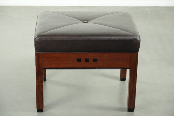 Image 1 of Luxe Schuitema Art Deco design set bestaande uit een fauteuil en hocker uit de Decoforma serie in chocolade bruin rundleer