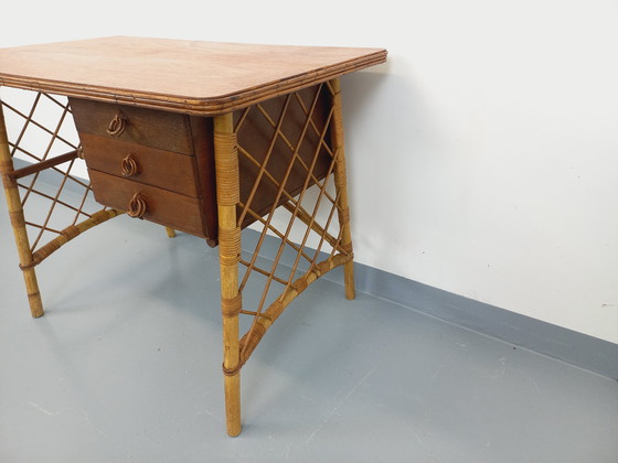 Image 1 of Vintage Louis Sognot bureau in rotan en hout uit de jaren 60