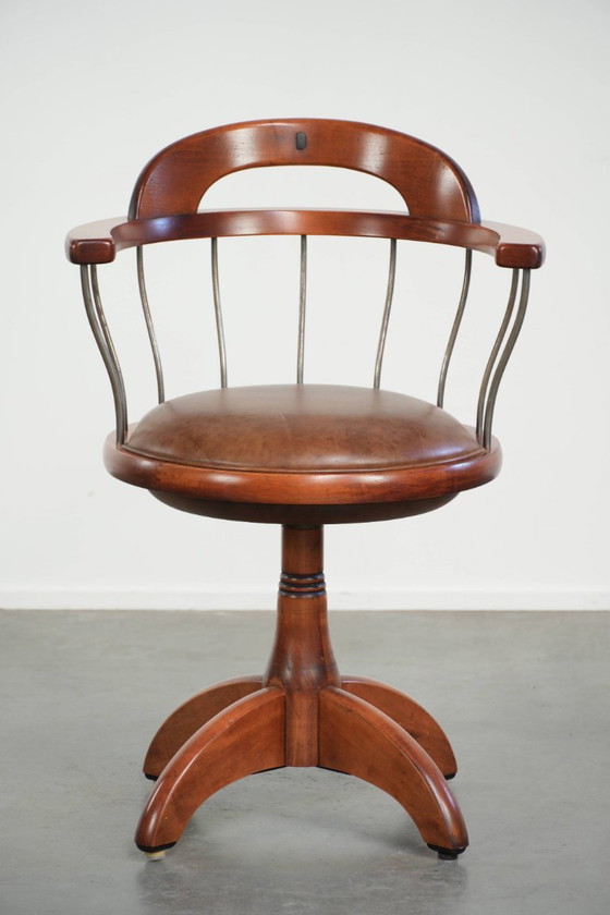Image 1 of Draaibare Schuitema stoel/ bijzetstoel/ bureaustoel met een cognac kleurige rundleren zitting