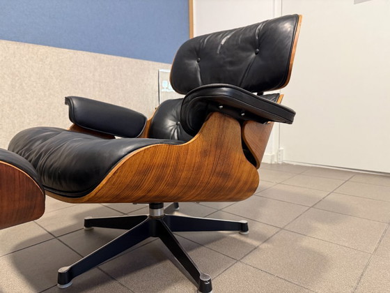 Image 1 of Herman Miller / Contura | Charles & Ray Eames | Lounge Chair & Ottoman | Rosewood & Black Leather | 1x Set