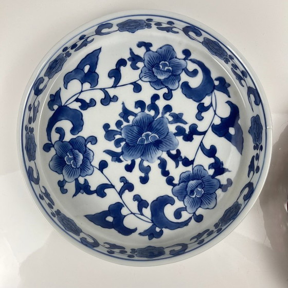 Image 1 of Set of 6 ceramic serving platters in white and blue floral pattern with woven wicker mount, 1970/80