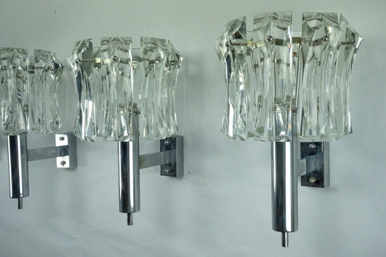 Image 1 of Ensemble de quatre grandes appliques en verre de Murano et en laiton chromé, Italie, années 1960.