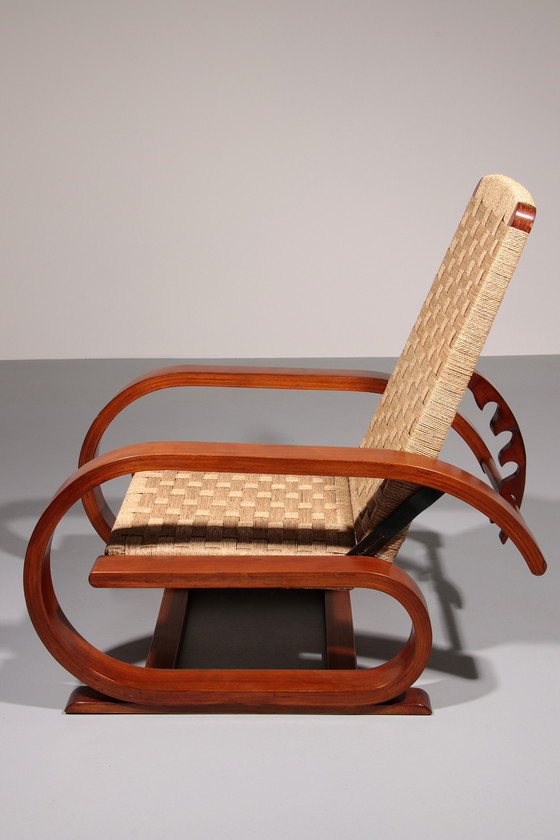Image 1 of Een uitzonderlijk zeldzame mahoniehouten fauteuil gemaakt in Italië in de jaren 1950