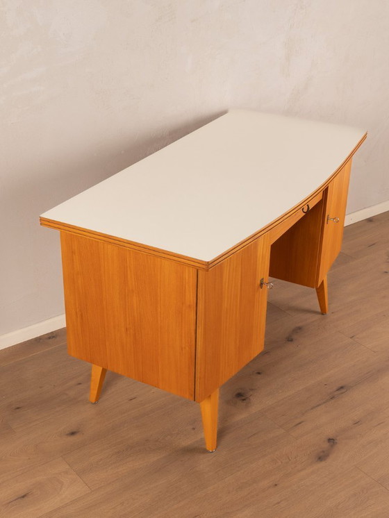 Image 1 of Vrijstaand houten bureau, jaren 50