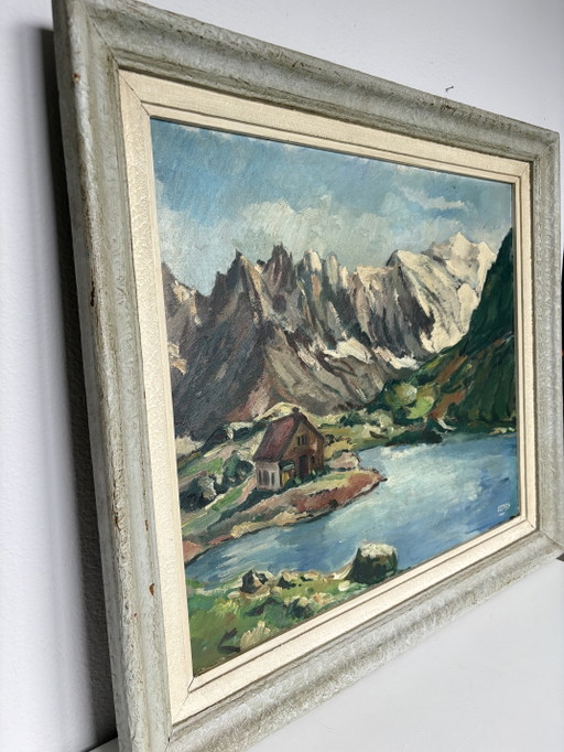 Vintage-Schloss am Alpensee: Vergoldetes Meisterwerk von E. Cools (1960)

