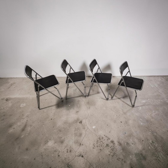 Image 1 of Set van 4 opklapbare stoelen in chroom- en leerstijl uit het midden van de 20e eeuw, Italië, jaren 70.