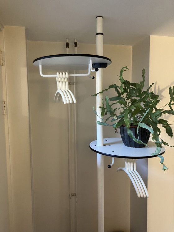 Image 1 of Designer coat rack, portable and height-adjustable so that it fits between ceiling and floor.
