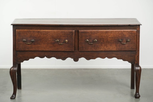 Beautifully sized antique 18th-century English oak dresser/sideboard with brass handles and beautiful colors.