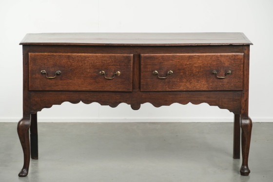 Image 1 of Beautifully sized antique 18th-century English oak dresser/sideboard with brass handles and beautiful colors.