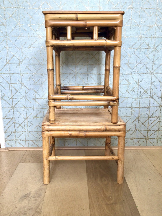 Image 1 of Set van 2 rotan bijzettafels uit het midden van de 20e eeuw