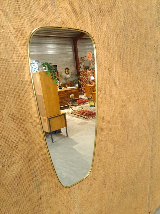 Jaren 50 spiegel met messing en zwarte rand