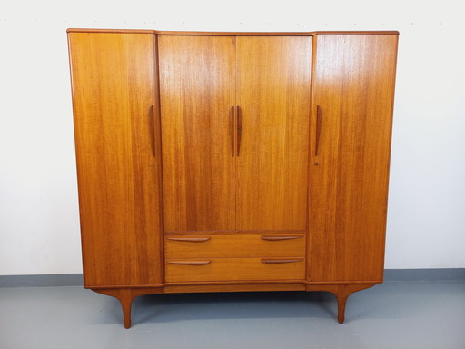 Scandinavian-style vintage cabinet in teak from the 60s by designers Tricoire and Vecchione for the "Meubles TV Paris" brand.