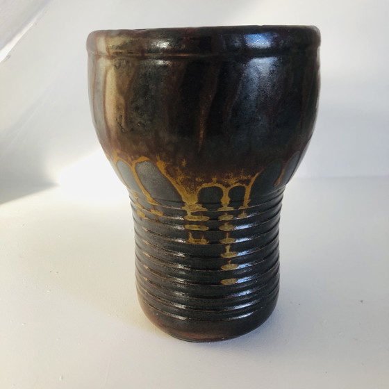 Image 1 of Vaso a torso in ceramica smaltata metallizzata