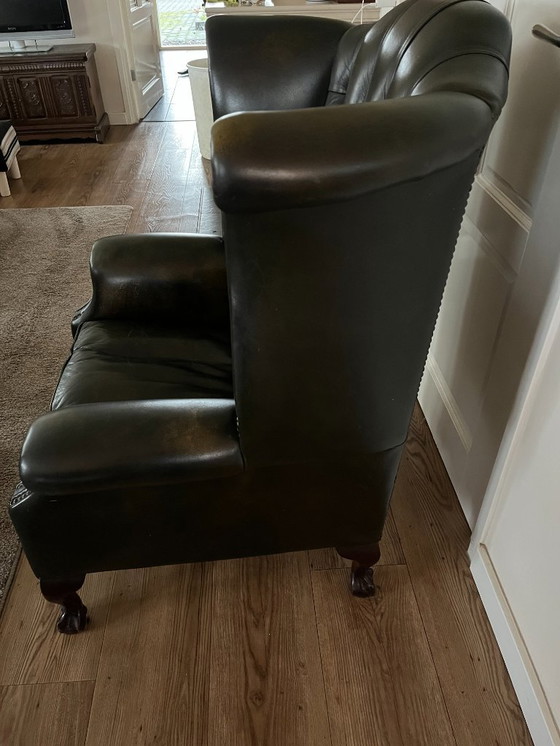 Image 1 of Fauteuil Chesterfield de luxe aux tons chauds marron