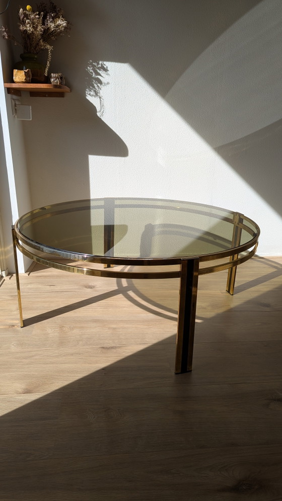 Image 1 of Hollywood Regency salontafel van zwart messing en gerookt glas