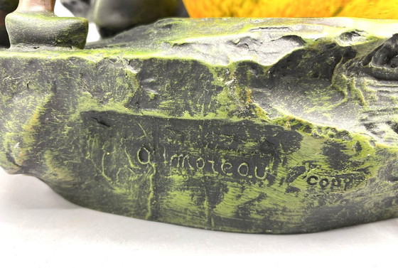 Image 1 of Art Deco stijl tafellamp met kinderen – sculpturale lamp met geel glas ca. 1970–1980 Copy van A. Moreau - Kunsthars