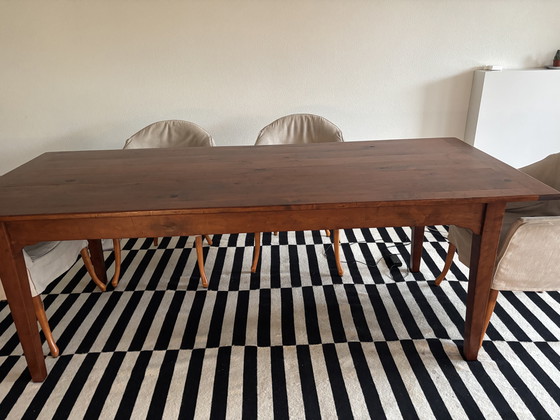 Image 1 of table à manger en bois de cerisier
