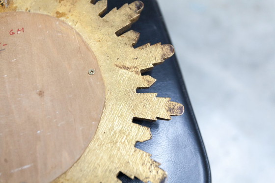 Image 1 of Vintage bolle spiegel uit de jaren 70 met heksenoogmotief en zonnestralenmotief.