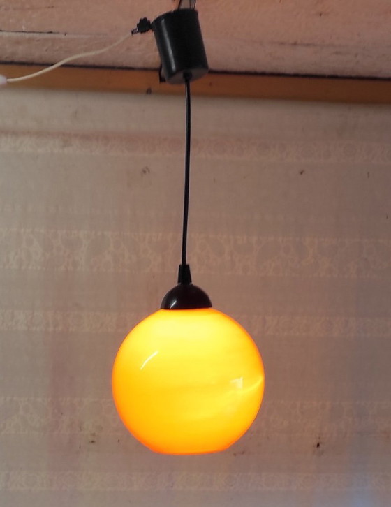 Image 1 of Lampada a sospensione a globo opalino arancione - anni '70