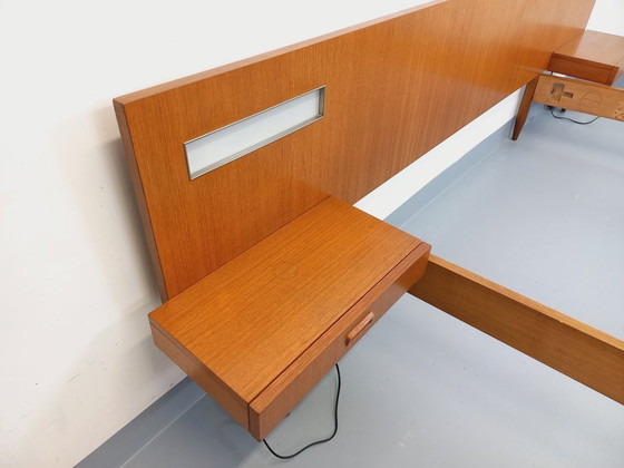 Image 1 of Lit double vintage style scandinave en teck des années 60 avec chevets suspendues et lampes intégrées