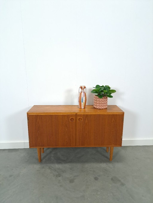 Teak cabinet with round handles