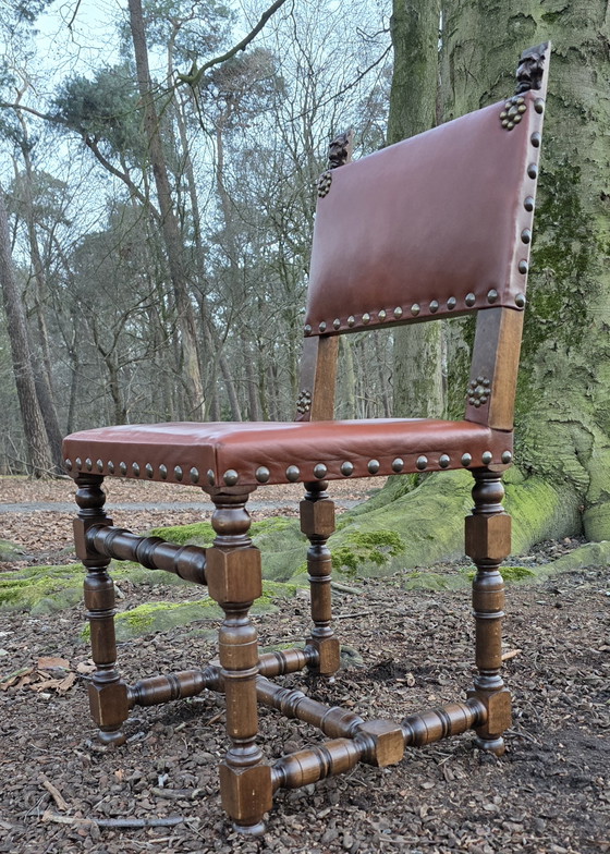 Image 1 of Set 4 vintage leren eetkamerstoelen eiken
