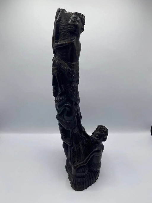 African solid wood sculpture - Column of stacked human figures - Upward movement - 41 cm – beeldhouwkunst